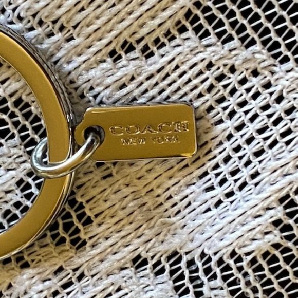 Coach Embossed Signature Logo Open Oval Shape Silver Keychain - Picture 13 of 13